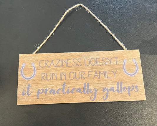 "Craziness doesn't run in our family, it practically Gallops" Langs Sign